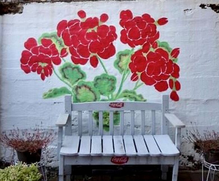 Landmark painting outside Full Circle Arts