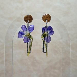 Wild violets on walnut stud